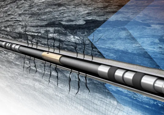 Cross-sectional illustration of a horizontal oil drilling well penetrating shale rock layers with hydraulic fracturing fluid injection.